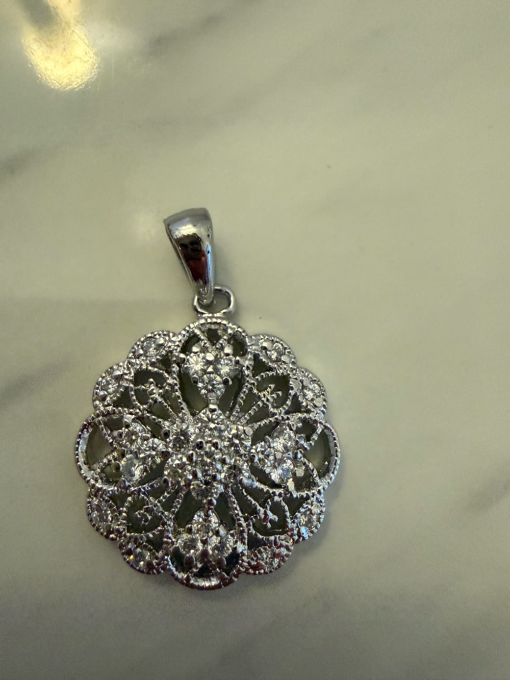 Sterling Silver Floral Filigree Pendant with Cubic Zirconias
